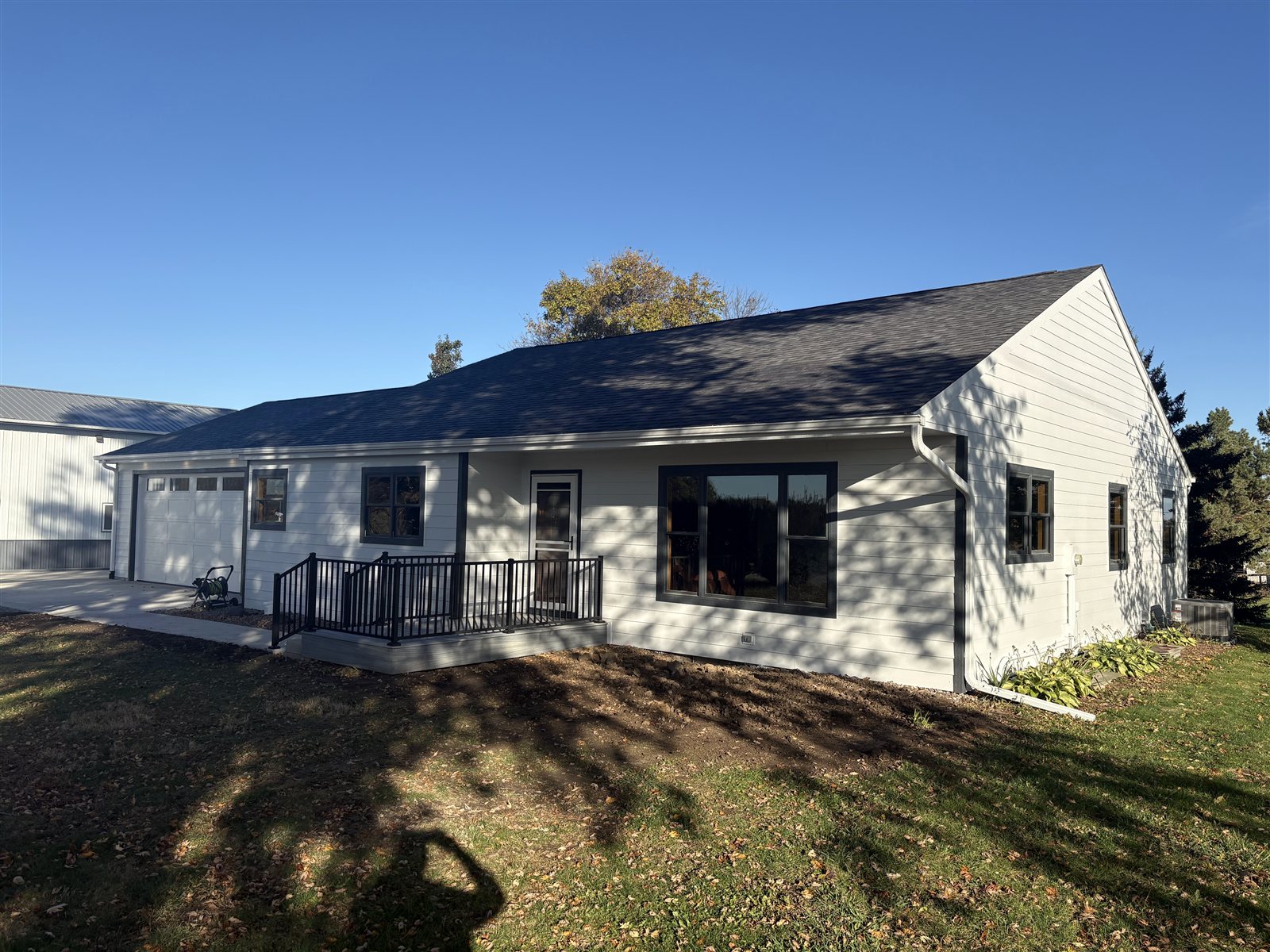 Earlham, Iowa — renovated exterior and deck